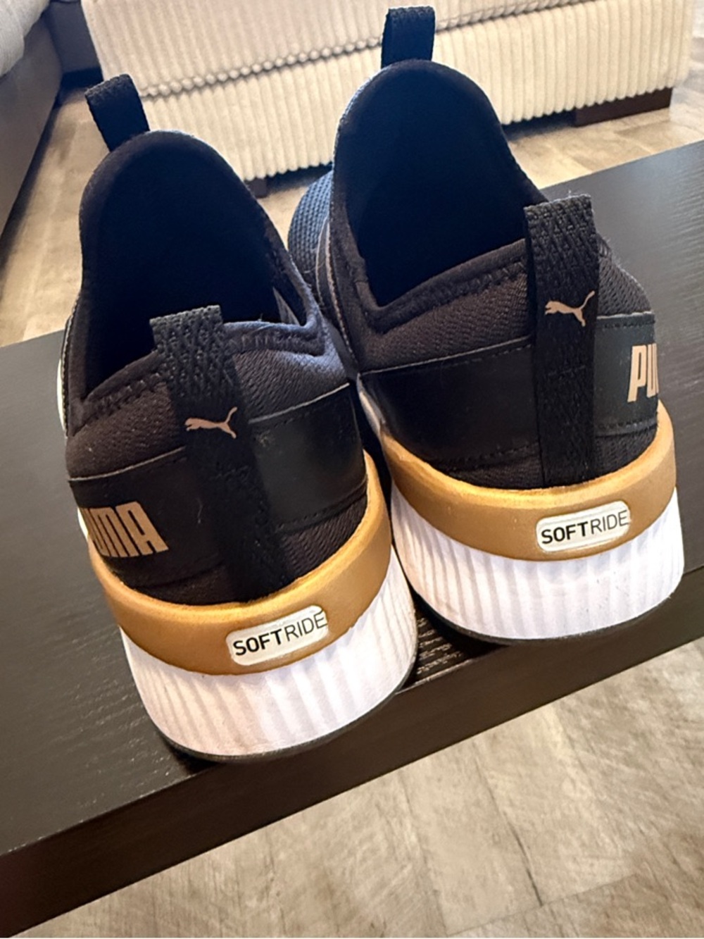 Puma women’s Black Slip-On Athletic Sneakers with Gold Accents - Picture 3 of 3